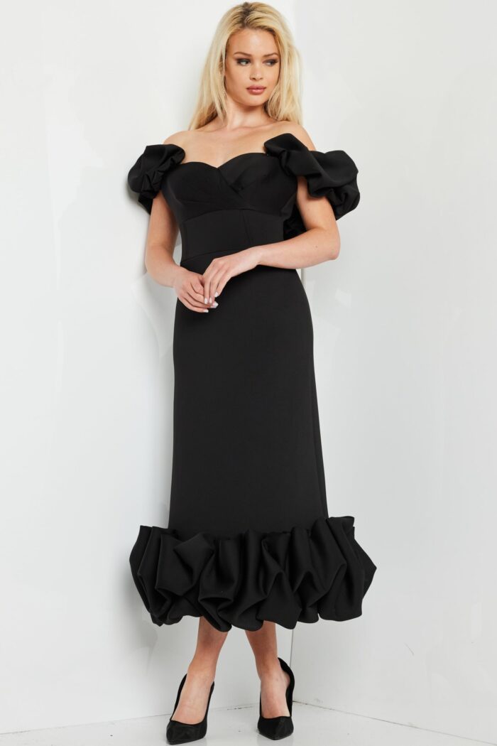 model wearing Jovani 24535 black dress, front view with ruffled details