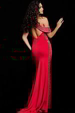 Back view of model wearing Jovani 24611 red gown showcasing the open back style.