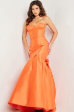 Model in Jovani 24613 displaying front view of the gown.
