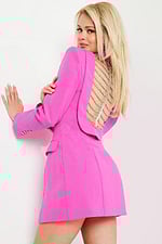 Model wearing 24619 hot pink mini dress featuring a chain detail on the back.