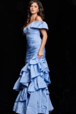 Side view of Jovani 24646 blue dress with ruched bodice and ruffled skirt.