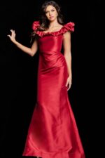 Model wearing 25675 red dress with ruffled neckline from the front view