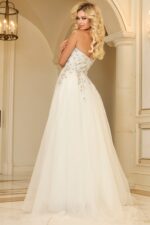 Model wearing Jovani 25691 white evening gown, back view with embellishment detail.