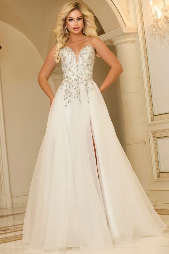 Model wearing Jovani 25691 white evening gown, front perspective highlighting the bodice details.
