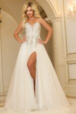 Model wearing Jovani 25691 white evening gown, front view with sweetheart neckline and embellishments.