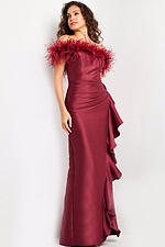 Model showcasing Jovani 25786 burgundy feathered gown, side angle.