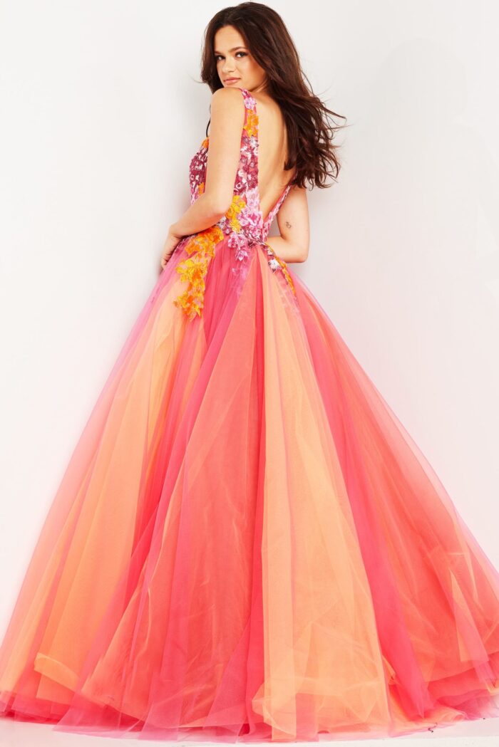 Model displaying the back of Jovani 25800 orange gown with elegant back design.