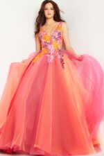 Model wearing Jovani 25800 orange A-line gown with V-neckline and floral details.