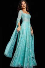Model wearing Jovani 25811 mint green floor-length dress with square neckline and sheer long sleeves.