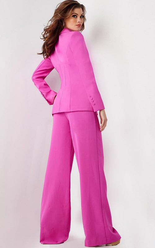 Model wearing Jovani 25834 pink blazer and wide-leg trousers, back view