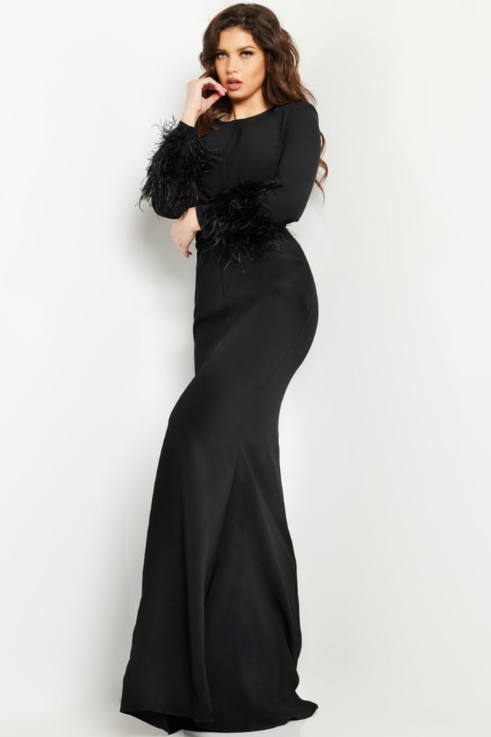 Model wearing Jovani 25898 black gown with flattering fit and feathered sleeves, front view.