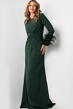 Model wearing Jovani 25898 green gown, slight side view.