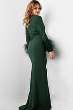 Back view of model wearing Jovani 25898 green dress.