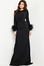 Model wearing Jovani 25898 black gown with fitted silhouette and feathered cuffs, front view.