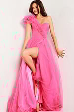Model wearing Jovani 25919 pink gown, front view showing movement