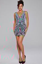 Model wearing Jovani 25925 in gold with intricate beadwork, back view.