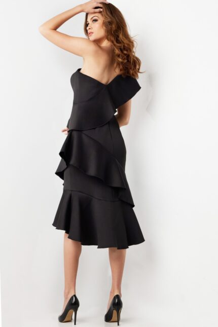 Back view of model in Jovani 25971 black dress highlighting one-shoulder design.