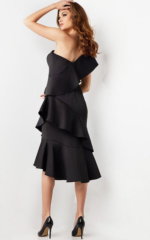 Back view of model in Jovani 25971 black dress highlighting one-shoulder design.