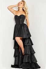 model wearing Jovani 26006 black dress with sweetheart neckline and tiered ruffles
