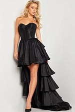 model posing in Jovani 26006 black dress with high-low silhouette