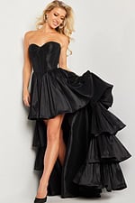 front view of model in Jovani 26006 black gown highlighting sweetheart neckline