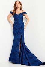 Model wearing Jovani 26017 cobalt blue gown with off-shoulder neckline and high slit, front view.