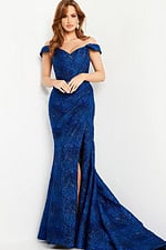 Model wearing Jovani 26017 cobalt blue gown with off-shoulder neckline and high slit, front view.