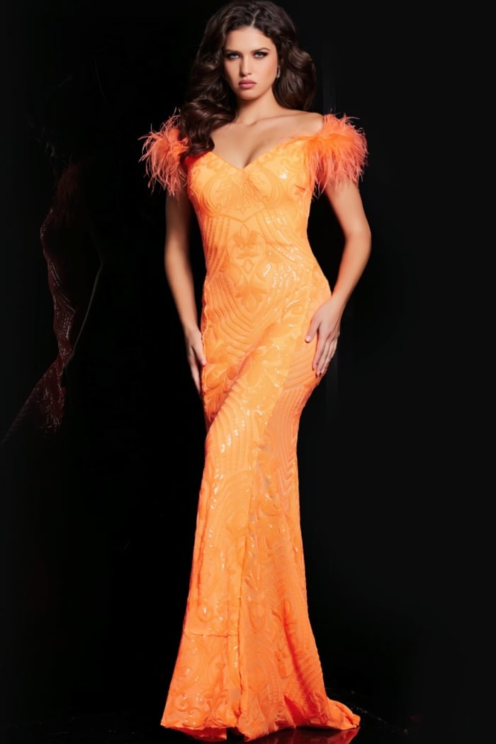 Model wearing Jovani 26041 orange mermaid gown with off-the-shoulder and feather accents.