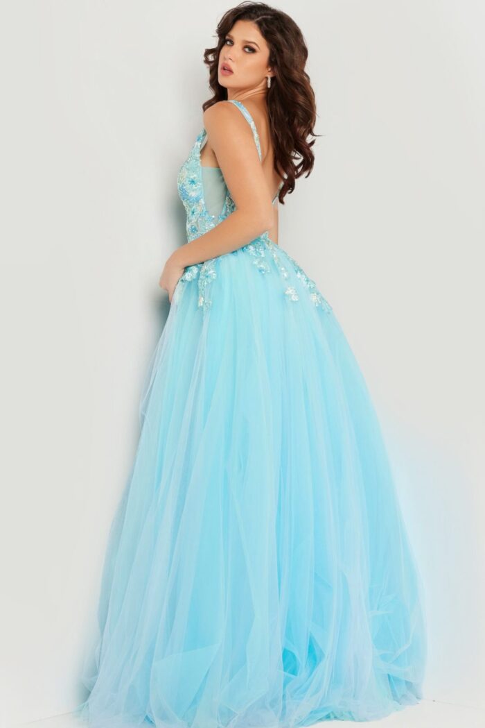 Model wearing Jovani 26045 back view of blue gown showing flowing silhouette.