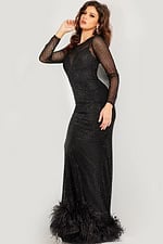 Side view of model wearing Jovani 26047 black gown with illusion neckline.