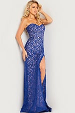 Model wearing Jovani 26051 royal blue lace gown showing side profile and sweetheart neckline.