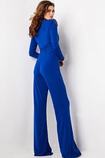 model wearing Jovani 26080 royal blue gown in back view with detailed neckline