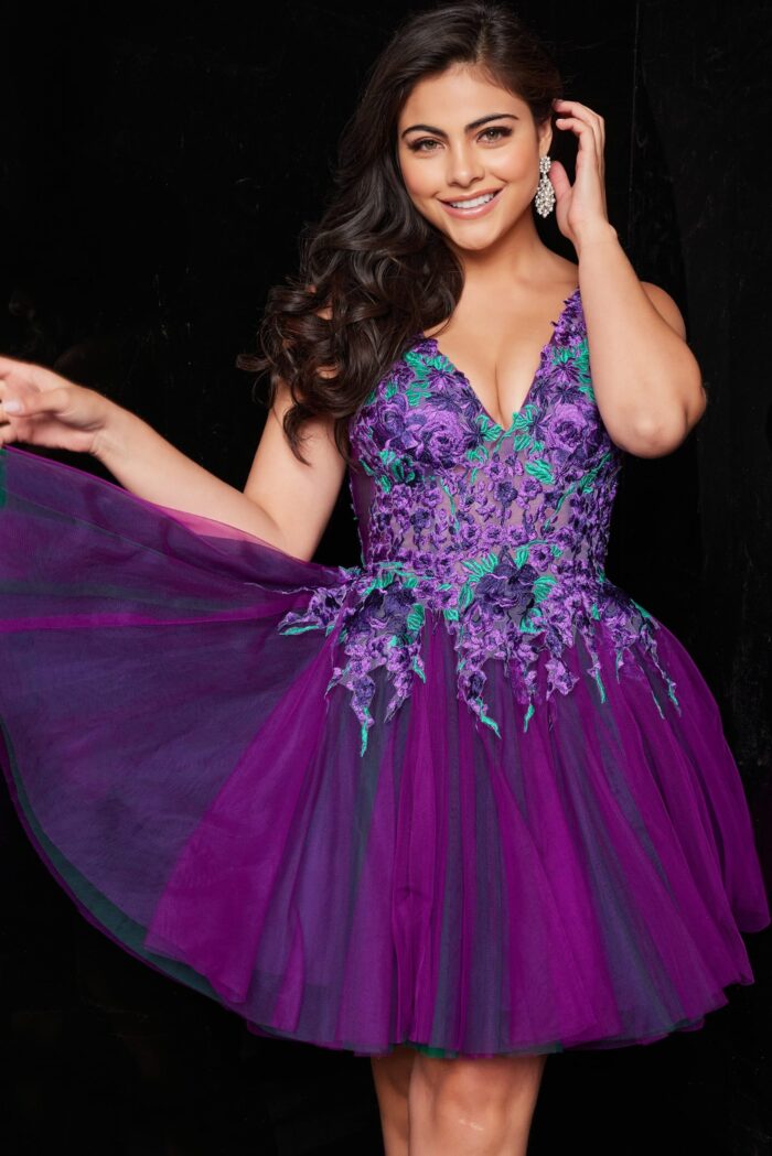 Model wearing Jovani 26096 purple dress with floral embroidery, showcasing front view.