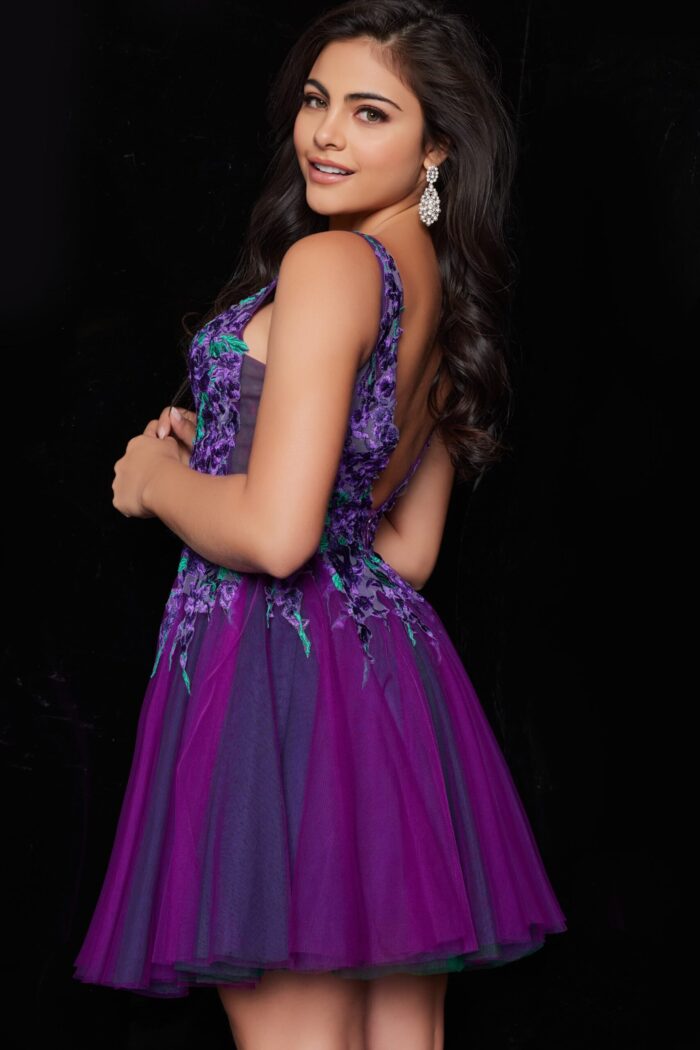 Model wearing Jovani 26096 purple dress showcasing the back view.