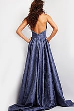 Back view of Jovani 26115 gray gown showing elegant drape and beaded neckline.