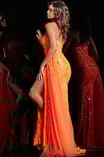 Back view of model in Jovani 26134 orange dress with strapless design.