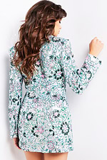 Model wearing Jovani 07807 multi-color dress with long sleeves and floral design, back view.