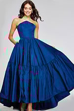 Model wearing Jovani 26152 with a navy A-line strapless gown, front view, full-length.