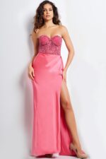 Model wearing Jovani 26165 pink gown with sweetheart neckline, fitted bodice, and high slit