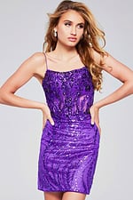 Model wearing Jovani 26183 purple mini dress with sequins, front view.