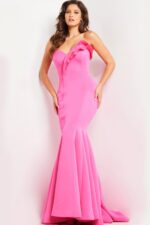 Model wearing Jovani 26200 deep pink mermaid gown with ruffle detail, front view.