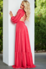 Model wearing Jovani 26247 coral dress highlighting back lace-up detail