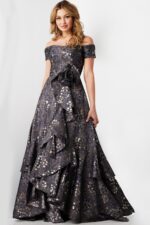 Model wearing Jovani 26256 gray dress front view with cascading ruffles