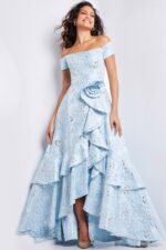 Model wearing Jovani 26256 light blue off-the-shoulder dress with ruffles