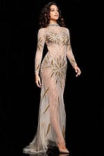 Model wearing Jovani 26257 nude gown with gold embellishments, front view posing.