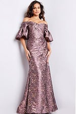 Model in side view of Jovani 26258 gold dress showcasing mermaid silhouette.