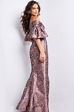 Side view of model wearing Jovani 26258 gold dress with ruffle sleeves.