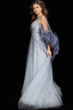 Side view of model in Jovani 26265 gray gown with embellishments and feathered tulle sleeves.
