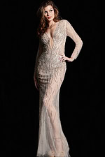 Front view of model in Jovani 26275 nude gown, showcasing V-neckline and long sleeves.