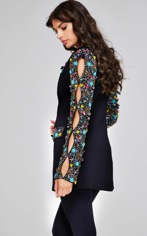 model wearing Jovani 26304 black dress, side view with embellishments